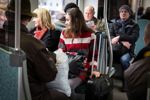 DEU Germany Germany Berlin Scenes in and around the S-Bahn.woman holding her suitcase while