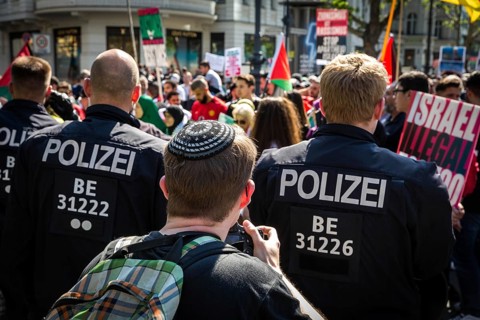 DEU Germany Germany Berlin Al Kuds march on Kudamm Press photographer with kippa