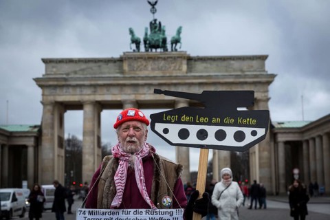 DEU Germany Germany Berlin A demonstrator protesting against arms deliveries to Turkey in front of