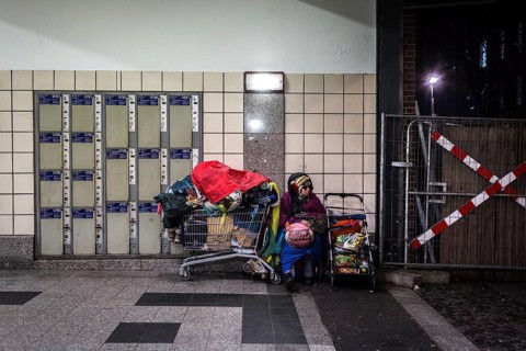 DEU Germany Germany Berlin Scenes of homeless people around Bahnhof Zoo. Woman with her belongings