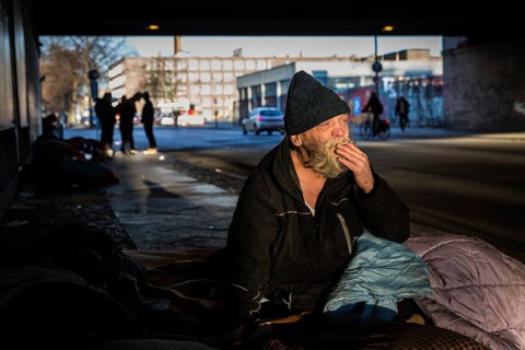 DEU Germany Germany Berlin Scenes of homeless people around Bahnhof Zoo.Gerard on his bed under a
