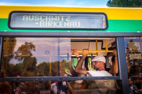 POL Poland Poland Auschwitz-Birkenau Tourists on the bus on the way to the Auschwitz-Birkenau camp