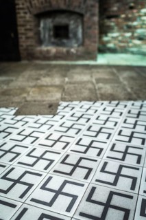 POL Poland Poland Krakow Krakow Tiles with swastikas in the exhibition of the Oskar Schindler
