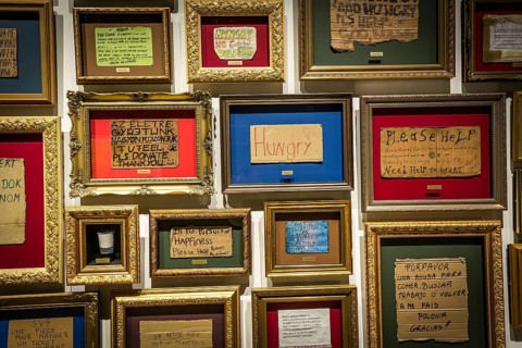 DEN Denmark Aarhus The Danish art museum Aros. Framed signs of homeless people