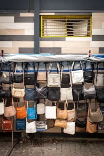 DEU Germany Germany Berlin Handbags at a market in Buckow
