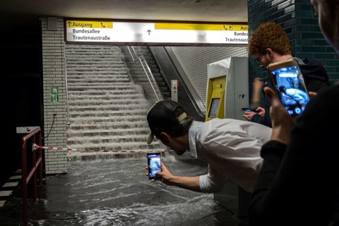 DEU Germany Germany Berlin Scene of the storm in Berlin. Souvenir photo in the flooded