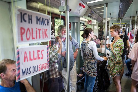 DEU Germany Germany Berlin Students discuss the G20 summit on the Berlin S-Bahn. A loose group of