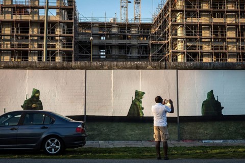 DEU Germany Germany Berlin A tourist takes a mobile phone photo of the installation 'Beyond the