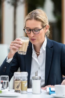 DEU Germany Germany Berlin AFD top candidate Alice Weidel drinks a cafe latte in front of a press