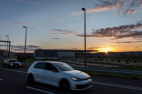 DEU Germany Germany Berlin Cars pass the future BER Berlin-Brandenburg airport at sunset
