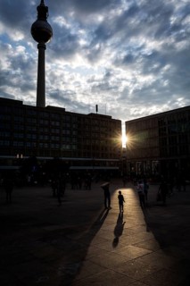 DEU Germany Germany Berlin People in the light at Alexanderplatz