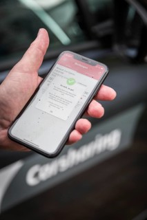 DEU Germany Germany Berlin Carsharing Flinkster with the Deutsche Bahn mobile phone app