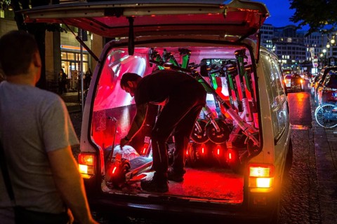 DEU Germany Germany Berlin So-called juicers collect discharged electric scooters at Potsdamer