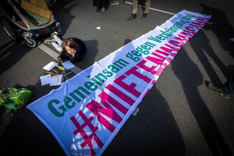 DEU Germany Germany Berlin Demonstration against rent increases and gentrification.child paints in