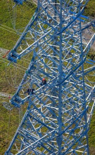 Aerial photo, construction power line Dortmund-Hagen, climber in power pylon, worker, height