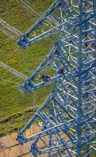 Aerial photo, construction power line Dortmund-Hagen, climber in power pylon, worker, height