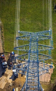 Aerial photo, construction power line Dortmund-Hagen, climber in power pylon, worker, height