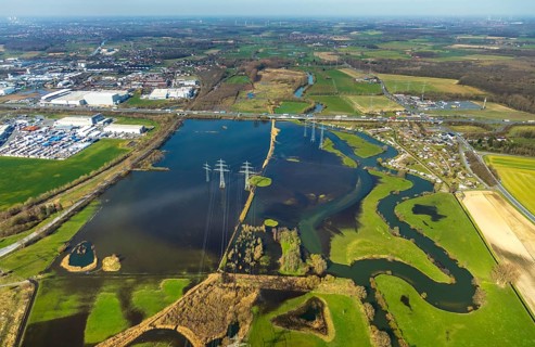 Aerial view, Flooded Lippe floodplain on the A2 motorway, electricity pylons, Uentrop campsite,