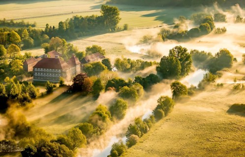 Aerial view, morning fog, Lippe river meadow, landscape in backlight, Oberwerries Castle, Hamm,