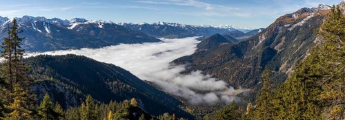 Autumn atmosphere, fog over the Enns Valley, snow on alpine mountain range, autumn leaves,