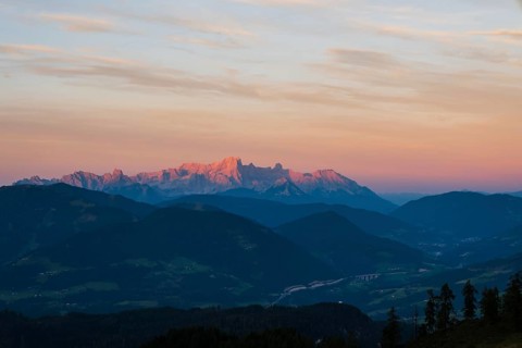 View from Mitterfeldalm to Hoher Dachstein at sunset, the Tauern motorway in the valley, Salzburg