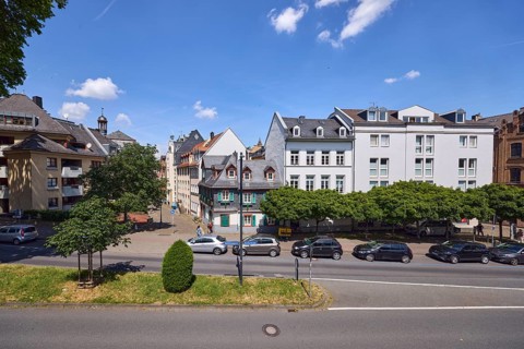 City center, general architecture, historic buildings, houses, roofs, asphalt road, central island,