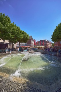 Pedestrian zone, fountain, courtyard fountain, general architecture, shops, retail, weekly market