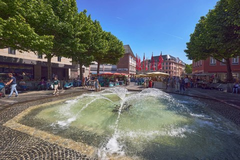 Pedestrian zone, fountain, courtyard fountain, general architecture, shops, retail, weekly market