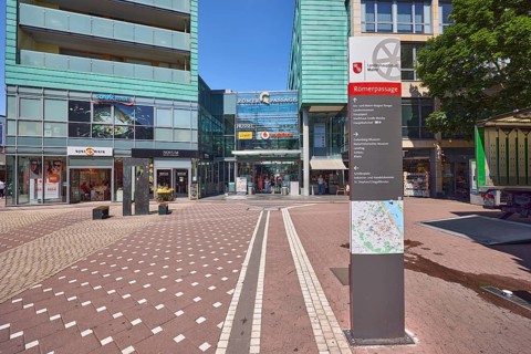 Stele with location sign, Roman passage, shopping center, general architecture, modern building,