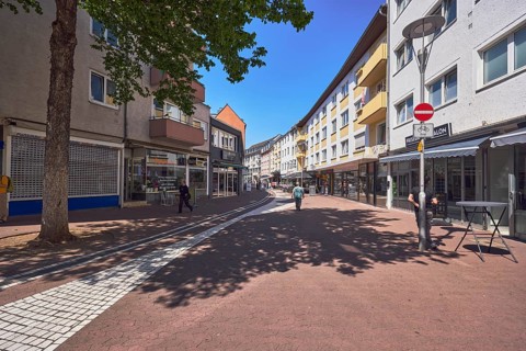 City center, retail, shopping, outdoor area of a restaurant, residential buildings and commercial