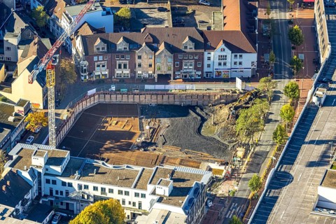 Aerial view, construction site with demolition and new construction of the western half of the