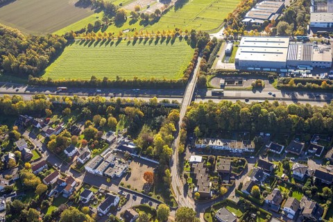 Aerial view, Wambelner Straße bridge over the A2 motorway, meadow area surrounded by autumn trees