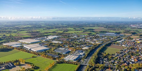 Aerial view, Oberster Kamp industrial park on the A2 motorway, meadows and fields with distant