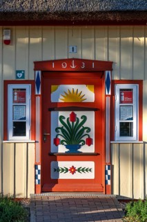 Decorative front door from 1931 on a residential building, Ahrtenshoop, Darß, Mecklenburg-Western