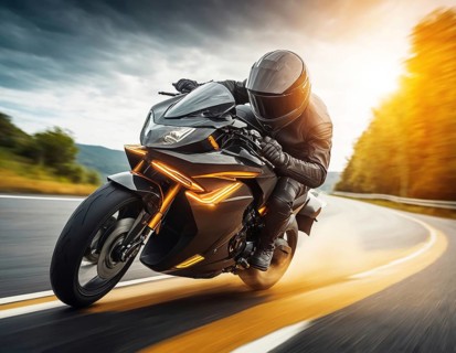 A dynamic shot of a motorcycle racer speeding on the road, vibrant and energetic, AI generated
