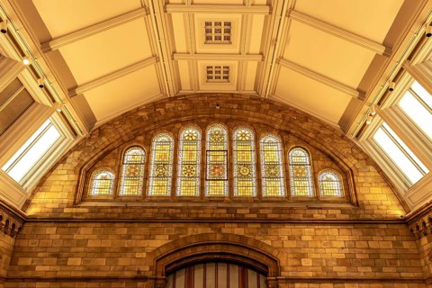 London, United Kingdom - 15 May 2025: Detailed close-up of the beautiful stained glass arched
