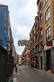London, United Kingdom - 15 May 2025: The classic London streetscape featuring the iconic soho