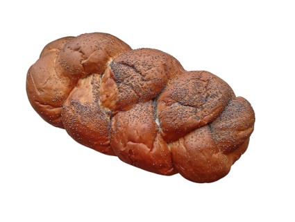 Large bun with poppy seeds close-up on white background