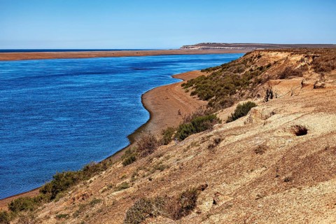 Estuary into the sea with rocky coast and extensive landscape, The landscape of Peninsula Valdes in