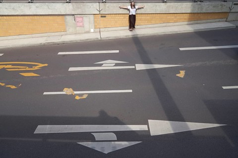 Feeling contrast of light and shadow on the street as metaphor for construction dilemma of warm and