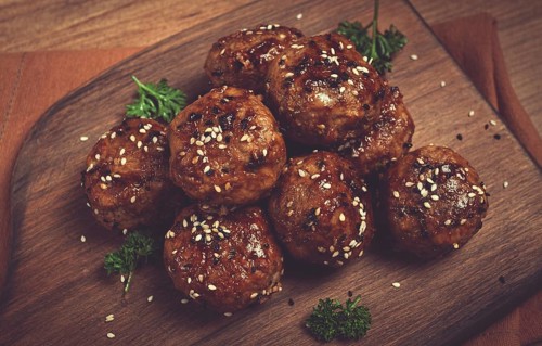 Tsukune, Japanese meatballs, minced chicken, fried on a skewer, with yakitori sauce, homemade, no
