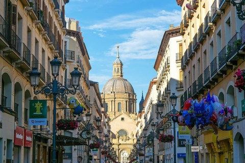 View of Basilica of Our Lady of the Pillar cathedral church from Calle de Alfonso I, Zaragoza,
