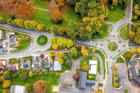 Aerial view, two green roundabouts Udemer Straße, autumn trees, Schneppenbaum, Bedburg-Hau, Lower