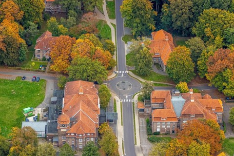 Aerial view, LVR-Klinik Bedburg-Hau, Buchenallee roundabout and medical building, autumn trees,