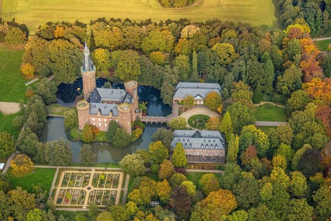 Aerial view, Moyland Castle Museum, neo-Gothic moated castle and castle park with herb garden,
