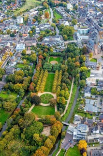 Aerial view, municipal park and autumn trees on the river Niers, tree-lined avenue and circular