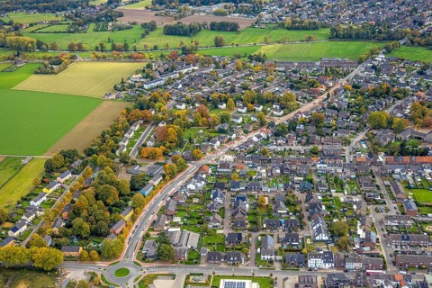 Aerial view, construction site and renovation Ostring with cycle path, residential area, Goch,