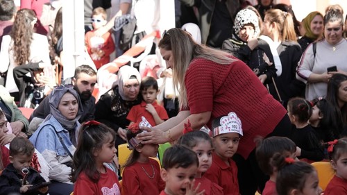 Children celebrate the 102nd anniversary of the Republic Day of Turkey, a national holiday