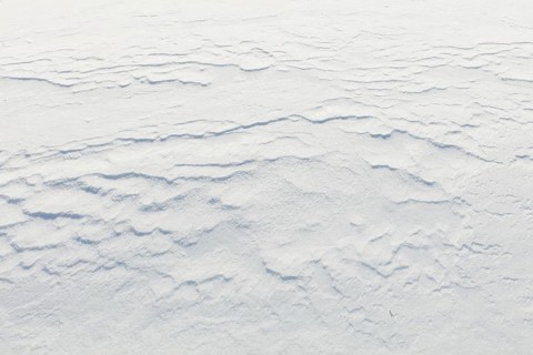 Wind has made patterns on snow surface, Toronsuo National Park, Tammela, Finland