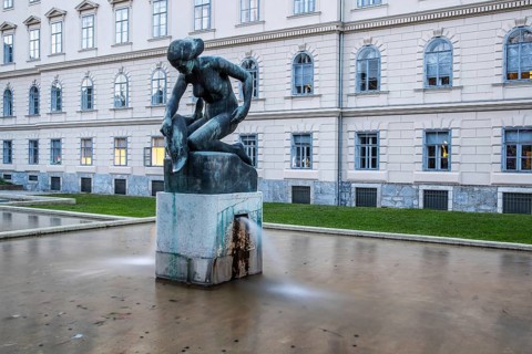 Sculpture, woman with dolphin, Graz, Styria, Austria